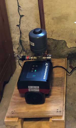 Water pressure booster pump installed by Absolute Precision Plumbing Heating & Cooling